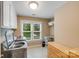 Convenient laundry room with front loading washer and dryer at 14314 Lissadell Cir, Charlotte, NC 28277