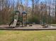 A charming playground set amidst lush greenery, offering outdoor fun at 14723 Sapphire Ln, Pineville, NC 28134