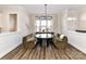 Dining room with unique booth seating, a round table, and natural light at 15140 Rocky Bluff Loop, Davidson, NC 28036