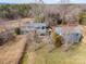 Aerial view of property showcasing landscaping, main house and guest house at 1740 12Th Street Nw Dr, Hickory, NC 28601