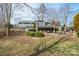Relaxing covered patio with stone pillars and a spacious yard perfect for outdoor entertaining at 1740 12Th Street Nw Dr, Hickory, NC 28601