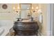 A bathroom featuring a decorative vanity with a sink and decorative lighting at 1740 12Th Street Nw Dr, Hickory, NC 28601