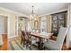 Stylish dining room featuring a large wooden table, stylish lighting, and beautiful decor at 1740 12Th Street Nw Dr, Hickory, NC 28601