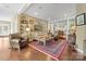 Inviting living room with hardwood floors, open floor plan, comfortable seating, and bright lighting at 1740 12Th Street Nw Dr, Hickory, NC 28601