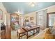 Inviting living room featuring hardwood floors, comfortable seating, a decorative ceiling, and ample natural light at 1740 12Th Street Nw Dr, Hickory, NC 28601