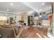 Spacious living room with hardwood floors, comfortable seating, and adjoins the modern kitchen at 1740 12Th Street Nw Dr, Hickory, NC 28601