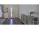 Elegant foyer featuring hardwood floors, a stylish console table, and a view of the front door at 17609 Caddy Ct, Charlotte, NC 28278