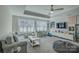Relaxing living room with ample natural light, comfortable seating, and modern decor, ideal for relaxation at 17609 Caddy Ct, Charlotte, NC 28278