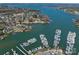 Panoramic aerial view of Lake Norman, featuring a marina filled with boats and waterfront homes at 19827 Henderson Rd # L, Cornelius, NC 28031