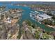 Stunning aerial view showcasing waterfront homes, boat docks, and a marina along the beautiful Lake Norman at 19827 Henderson Rd # L, Cornelius, NC 28031