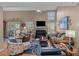 Inviting living room with a fireplace, comfortable seating, and a bright atmosphere at 19827 Henderson Rd # L, Cornelius, NC 28031