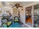 Inviting outdoor patio with comfortable seating, fan, and scenic views at 19827 Henderson Rd # L, Cornelius, NC 28031