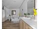 Bright bathroom with a soaking tub, vanity, and modern fixtures and decor at 2013 Vick Wilson Rd, Shelby, NC 28152
