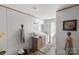 Well-lit bathroom featuring a double sink vanity, decorative accents, and wood-look flooring at 2013 Vick Wilson Rd, Shelby, NC 28152