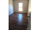 Sunlit bedroom with modern flooring and neutral walls, creating a serene atmosphere at 2013 Vick Wilson Rd, Shelby, NC 28152