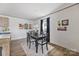 Elegant dining area with dark wood table set, complemented by modern decor at 2013 Vick Wilson Rd, Shelby, NC 28152