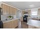 Inviting kitchen with warm cabinets, complete with a center island and modern appliances for a delightful cooking experience at 2013 Vick Wilson Rd, Shelby, NC 28152