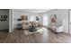 Inviting living room with wood flooring, neutral-toned furniture, and bright natural light at 2013 Vick Wilson Rd, Shelby, NC 28152