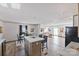 Open concept living room with a large island, seamlessly connecting to the dining and seating areas at 2013 Vick Wilson Rd, Shelby, NC 28152