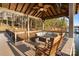 Gazebo with comfortable seating, ceiling fan, and great water view at 208 Woodwinds Dr, Mount Holly, NC 28120