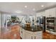 Gourmet kitchen with stainless steel appliances and center island at 208 Woodwinds Dr, Mount Holly, NC 28120