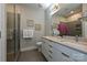 Modern bathroom showcasing a glass enclosed shower, dual vanity sinks, and contemporary finishes at 231 Uptown West Dr, Charlotte, NC 28208