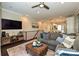 Comfortable living room with modern furnishings, TV, and hardwood floors at 231 Uptown West Dr, Charlotte, NC 28208