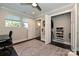 Bright, stylish office space with a closet and organized shoe storage, providing great form and function at 231 Uptown West Dr, Charlotte, NC 28208