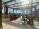 Inviting outdoor seating area features a modern design, comfortable seating, and a transparent canopy for a light-filled ambiance at 231 Uptown West Dr, Charlotte, NC 28208