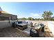 Outdoor patio with comfortable seating around a fire pit, perfect for entertaining and relaxation at 231 Uptown West Dr, Charlotte, NC 28208