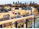 Spacious rooftop terrace with lounge seating and covered dining, perfect for entertaining guests at 231 Uptown West Dr, Charlotte, NC 28208