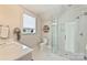 Modern bathroom with a glass-enclosed shower and stylish fixtures at 2509 Montrose Ct, Charlotte, NC 28207