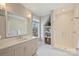 Bright bathroom with custom vanity and a glass shower at 2509 Montrose Ct, Charlotte, NC 28207