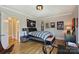 Bright bedroom with hardwood floors and sports-themed decorations at 2509 Montrose Ct, Charlotte, NC 28207