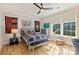 Bedroom featuring a sports-themed decor, a ceiling fan, and natural light at 2509 Montrose Ct, Charlotte, NC 28207