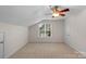 Bedroom features neutral carpet, a window with blinds, ceiling fan and a closet at 2711 Liberty Hall Ct, Waxhaw, NC 28173