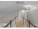 Hallway showcasing wooden banisters, neutral carpet, with white trim and freshly painted walls at 2711 Liberty Hall Ct, Waxhaw, NC 28173