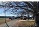 Expansive backyard features open fields, outbuildings, and mature trees, offering privacy and space at 3423 Crowder Ridge Rd, Shelby, NC 28150