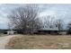 Quaint brick home on a spacious lot, showcasing its classic architecture and serene rural setting at 3423 Crowder Ridge Rd, Shelby, NC 28150