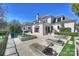 Rear exterior view of the house featuring the pool, spa, and lounging area at 4018 St Germaine Ln, Charlotte, NC 28210