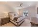Cozy bedroom featuring a large bed with neutral tones and a window view at 4018 St Germaine Ln, Charlotte, NC 28210