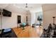 Spacious home gym with hardwood floors and modern exercise equipment at 4018 St Germaine Ln, Charlotte, NC 28210