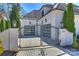 Elegant gated entrance to a home with a brick facade at 4018 St Germaine Ln, Charlotte, NC 28210
