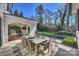 Outdoor patio featuring a dining area, outdoor kitchen and pool at 4018 St Germaine Ln, Charlotte, NC 28210