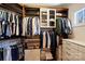 This sizable closet showcases shelving units, custom storage cabinets, and sleek drawer designs at 4018 St Germaine Ln, Charlotte, NC 28210