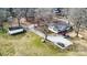Spacious property featuring a well-maintained house, ample parking, detached garage, and mature trees on a large lot at 422 Lee Ave, Wadesboro, NC 28170