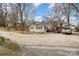 Well-maintained home with a spacious driveway, lovely landscaping, and a charming front porch perfect for relaxing outdoors at 422 Lee Ave, Wadesboro, NC 28170