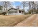 Attractive home exterior featuring a covered porch and mature landscaping on a spacious lot at 422 Lee Ave, Wadesboro, NC 28170