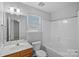 Bright bathroom with vanity, toilet, and shower/tub combination at 4264 Glenlea Commons E Dr, Charlotte, NC 28216