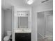 Bathroom with a vanity, mirror, lighting, toilet, and access to a large tub at 4264 Glenlea Commons E Dr, Charlotte, NC 28216